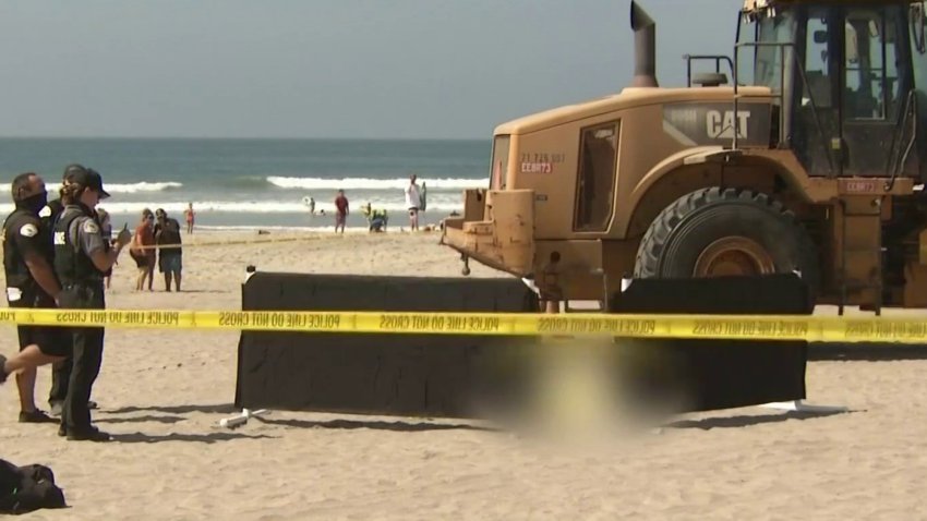 Muere arrollada en la playa por maquinaria pesada