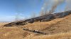 Bomberos combaten incendio forestal cerca de Grapevine