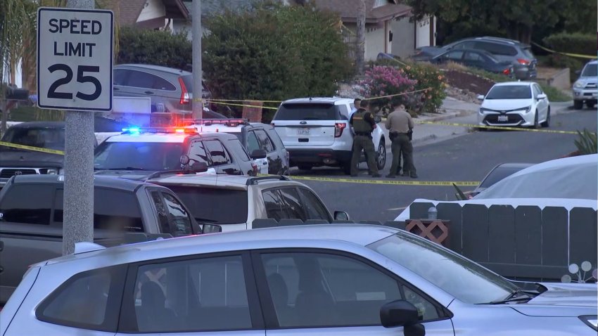 San Diego County Sheriff's Department Deputies at the scene of a fatal shooting investigation in Lemon Grove on Monday, July 12, 2021.