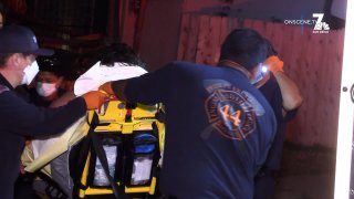 The 20-year-old victim being loaded into an ambulance early on Monday morning in Otay Mesa.