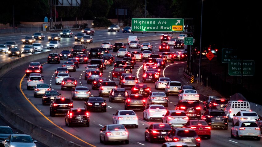 Motor vehicles drive on the 101 freeway in Los Angeles, California.