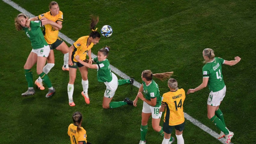 Australia’s forward #16 Hayley Raso (3rd L) attempts to head the ball past Ireland’s midfielder Sinead Farrelly during the Australia and New Zealand 2023 Women’s World Cup Group B football match between Australia and Ireland at Stadium Australia, also known as Olympic Stadium, in Sydney on July 20, 2023. (Photo by FRANCK FIFE / AFP) (Photo by FRANCK FIFE/AFP via Getty Images)