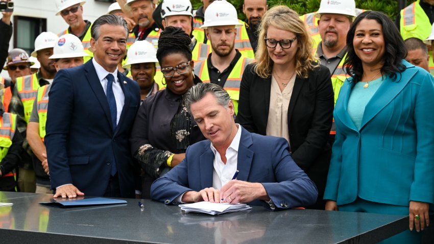 SAN FRANCISCO, CALIFORNIA – SEPTEMBER 19: Governor Gavin Newsom sings bills during a press conference of housing & homelessness with new legislation and funding, along with other local, state and federal leaders are gathered in San Francisco, California, United States on September 19, 2024. (Photo by Tayfun Coskun/Anadolu via Getty Images)