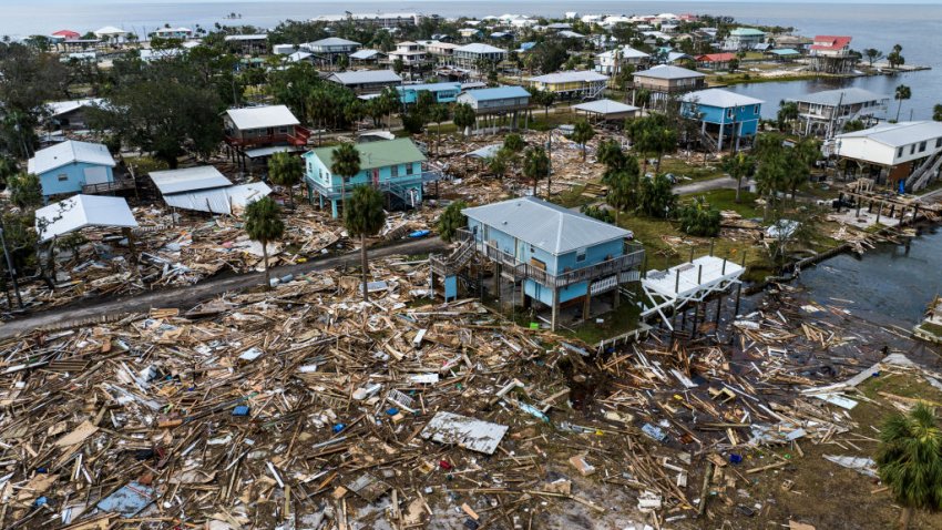 An aerial view of damaged houses are seen after Hurricane Helene made landfall in Horseshoe Beach, Florida, on September 28, 2024. At least 44 people died across five US states battered by powerful storm Helene, authorities said on September 27, after torrential flooding prompted emergency responders to launch massive rescue operations. (Photo by CHANDAN KHANNA / AFP) (Photo by CHANDAN KHANNA/AFP via Getty Images)