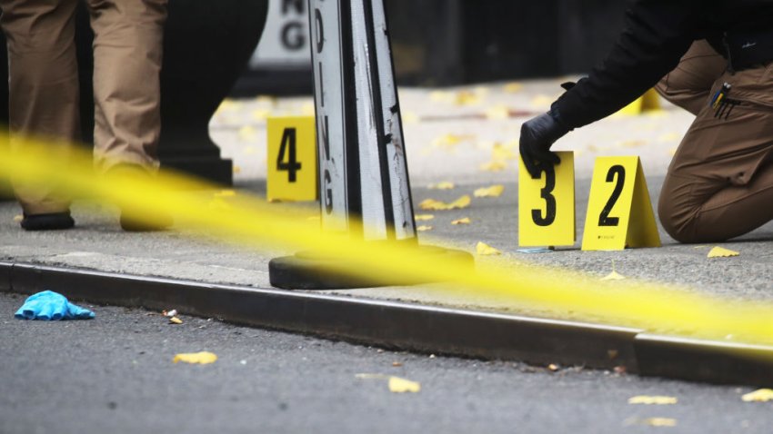 NEW YORK, NEW YORK – DECEMBER 04: Police place bullet casing markers outside of a Hilton Hotel in Midtown Manhattan where United Healthcare CEO Brian Thompson was fatally shot on December 04, 2024 in New York City. Brian Thompson was shot and killed before 7:00 AM this morning outside the Hilton Hotel, just before he was set to attend the company’s annual investors’ meeting. (Photo by Spencer Platt/Getty Images)