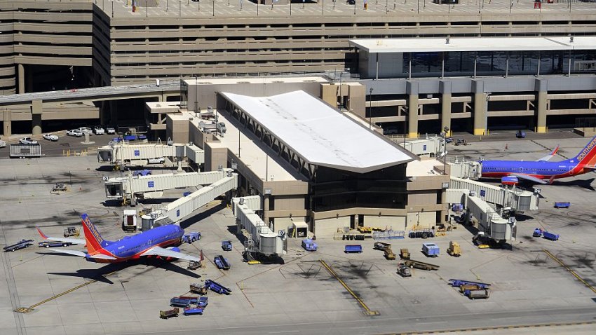 PHOENIX, AZ – SEPTEMBER 28, 2014: An aerial view of the Southwest Airlines gates as seen from the window of a departing plane at Phoenix Sky Harbor International Airport in Phoenix, Arizona. (Photo by Robert Alexander/Getty Images)