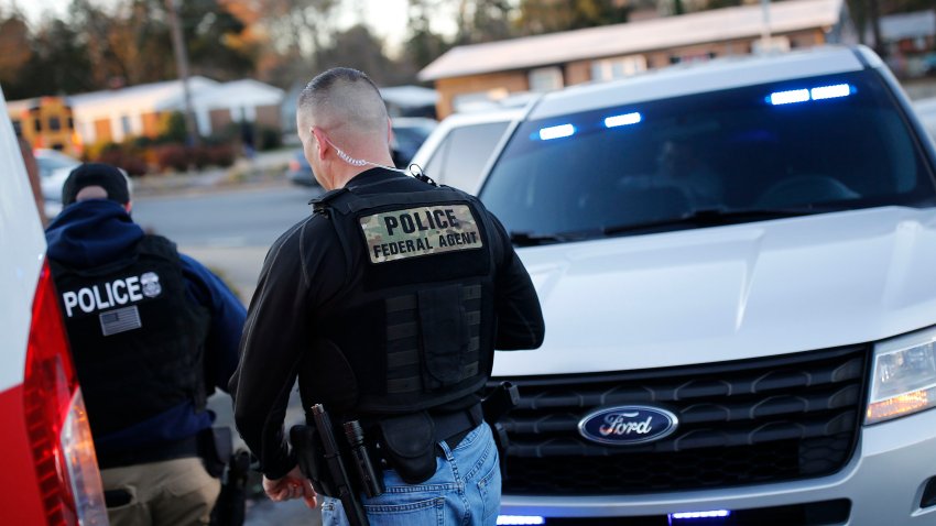 CHARLOTTE, NC – January 8: Immigration and Customs Enforcement agents work a traffic stop to detain an undocumented immigrant with a criminal record after an early morning stakeout, Wednesday, January 8, 2020. While agents in the Charlotte Field Office are in charge of thousands of cases at a time, ICE and the Mecklenburg County Sheriff have quarreled over the sheriff’s refusal to follow ICE detainers. (Photo by Eamon Queeney/For The Washington Post via Getty Images)