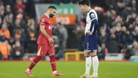 Liverpool’s Mohamed Salah (left) and Tottenham Hotspur’s Son Heung-Min during the Carabao Cup Semi-Final, second leg match at Anfield, Liverpool. Picture date: Thursday February 6, 2025. (Photo by Nick Potts/PA Images via Getty Images)