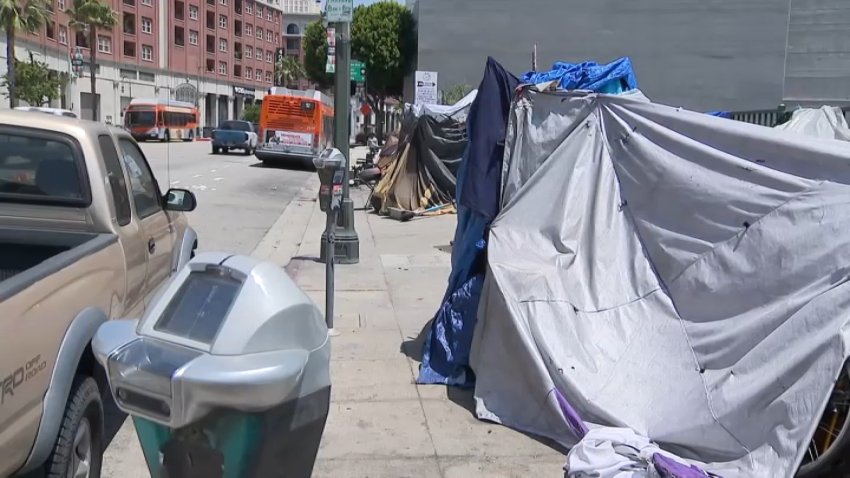 A homeless encampment on the sidewalk near Main and West 11th Streets in downtown Los Angeles.