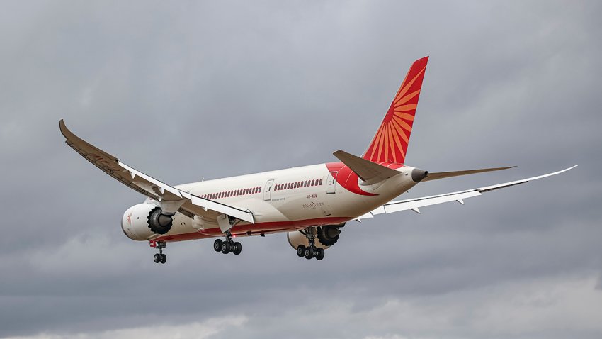 Air India Boeing 787 Dreamliner aircraft as seen on final approach flying for landing at London Heathrow airport during a cloudy day over Myrtle Avenue, a famous planespotting location. The modern and advanced Boeing 787-8 wide body enger plane has the registration VT-ANW and is powered by 2x GE jet engines. Air India is the Indian flag carrier with headquarters at New Delhi and member of Star Alliance aviation group. Air India is owned by Tata Group, formerly AirIndia Limited was owned by the Government of India. London Heathrow Airport LHR, United Kingdom on August 2022 (Photo by Nicolas Economou/NurPhoto via Getty Images)