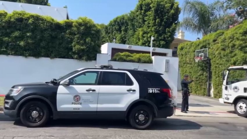 Officers at the scene of a shooting in Encino July 15, 2025.