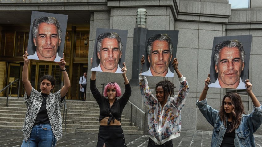 NEW YORK, NY – JULY 08: A protest group called "Hot Mess" hold up signs of Jeffrey Epstein in front of the Federal courthouse on July 8, 2019 in New York City. According to reports, Epstein will be charged with one count of sex trafficking of minors and one count of conspiracy to engage in sex trafficking of minors. (Photo by Stephanie Keith/Getty Images)