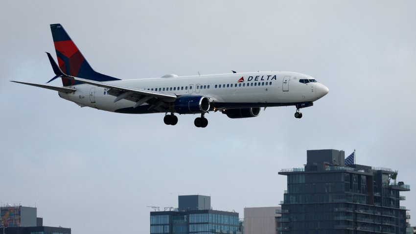 SAN DIEGO, CALIFORNIA – APRIL 24: A Delta Air Lines Boeing 737 airplane approaches San Diego International Airport for a landing arriving from Seattle on April 24, 2026 in San Diego, California.  (Photo by Kevin Carter/Getty Images)
